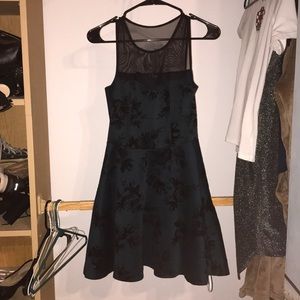 I’m selling a dark green maxi dress.